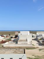 Av immeuble de 4 étages pas loin de la mer